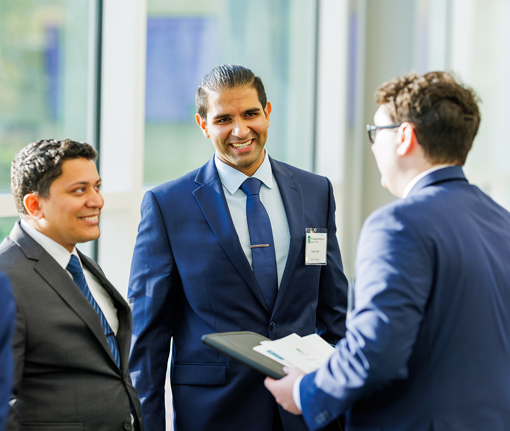 Woman smiling and clapping