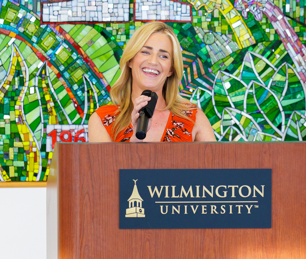 Woman smiling and clapping